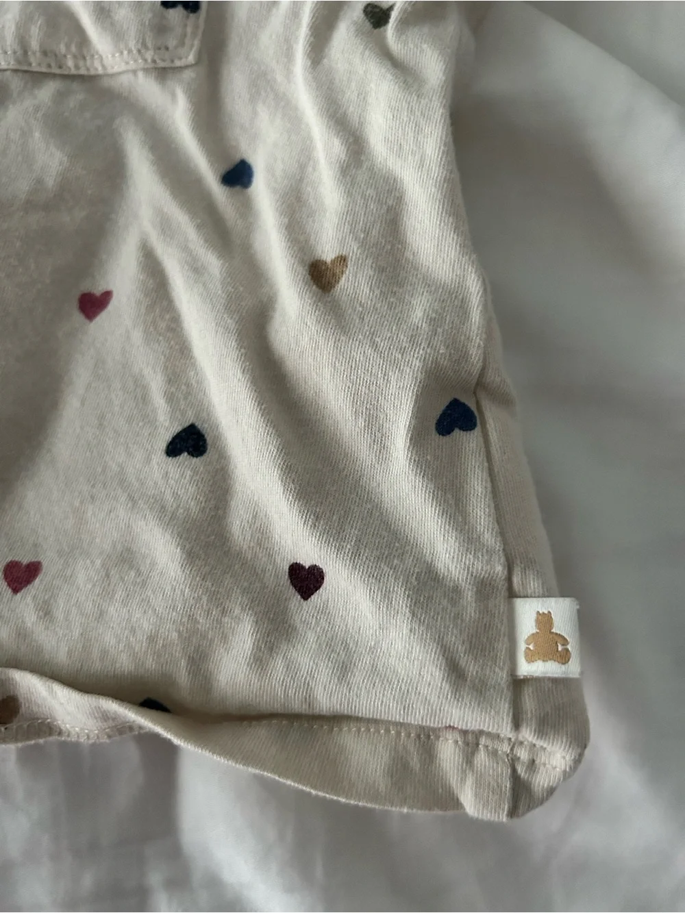 BabyGap Cream Top with multi color hearts